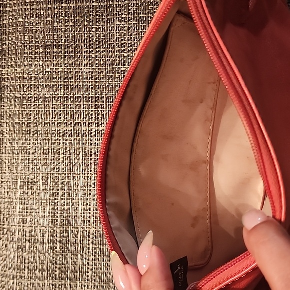 This is a Coral Coach Clutch.It is slightly used, but the perfect bag for summer - Picture 5 of 5